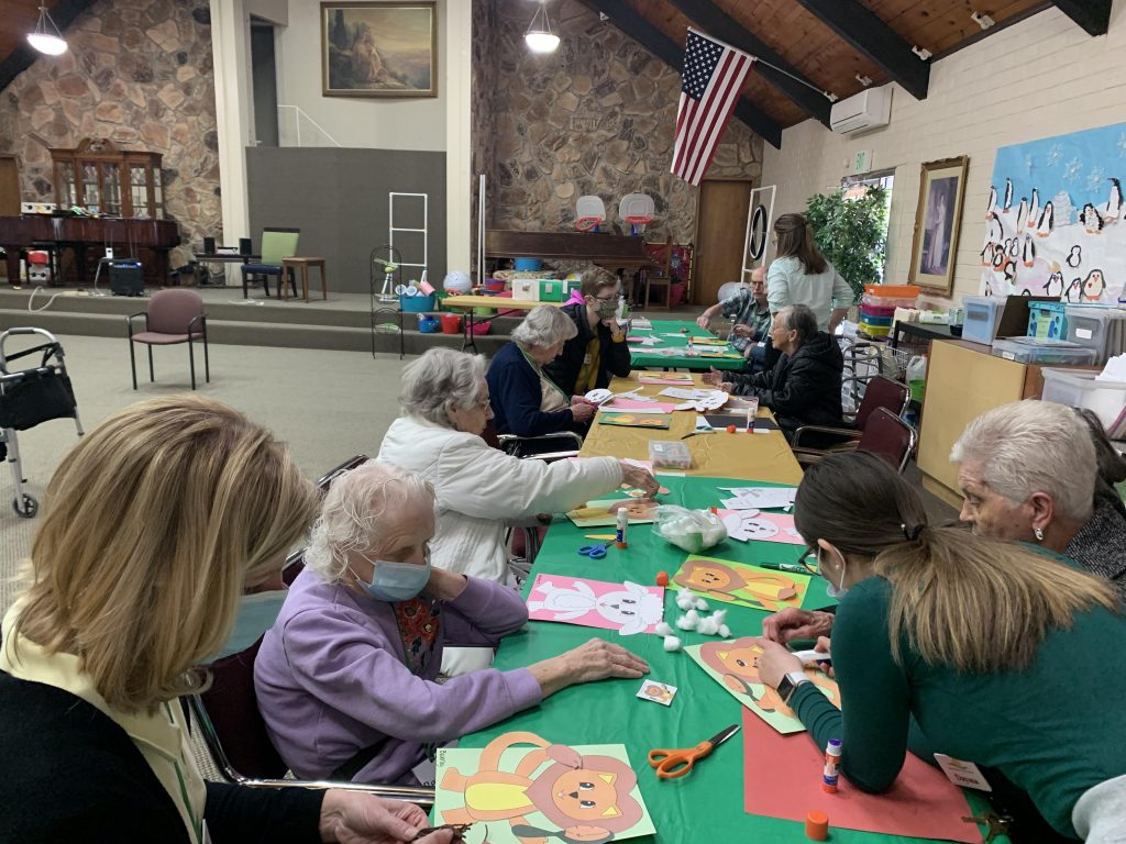 Elderly clients doing art at Aspen Senior Day Center