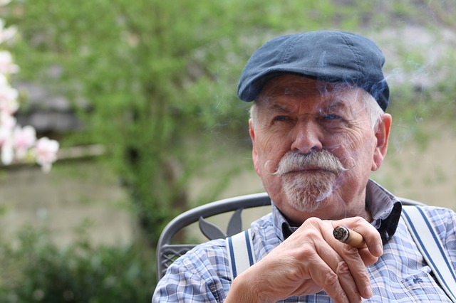 Elderly Man sitting at the park - Image by sarablatter from Pixabay